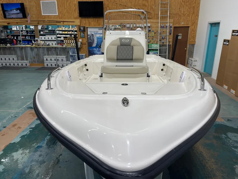 Slide: The Image of 2025 Key West 1720CC boat displayed indoors, showcasing sleek design and spacious seating. - 5