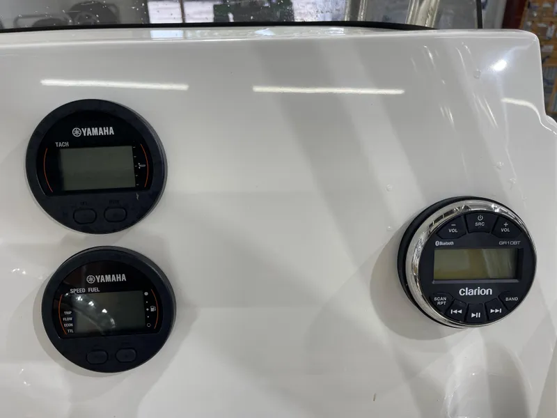 Slide: The Image of Dashboard of 2025 Key West 203FS boat with Yamaha gauges and Clarion audio system. - 22