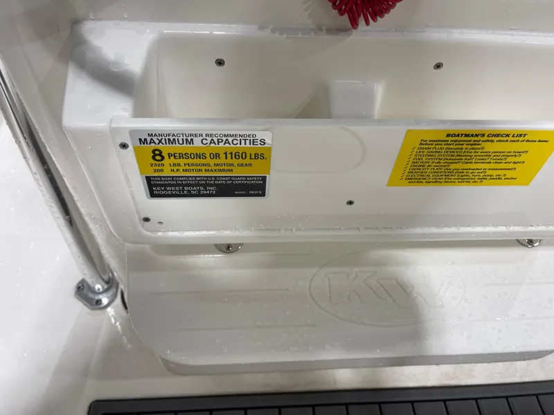 Slide: The Image of Key West 203FS 2025 boat capacity label, maximum 8 persons or 1160 lbs. - 25