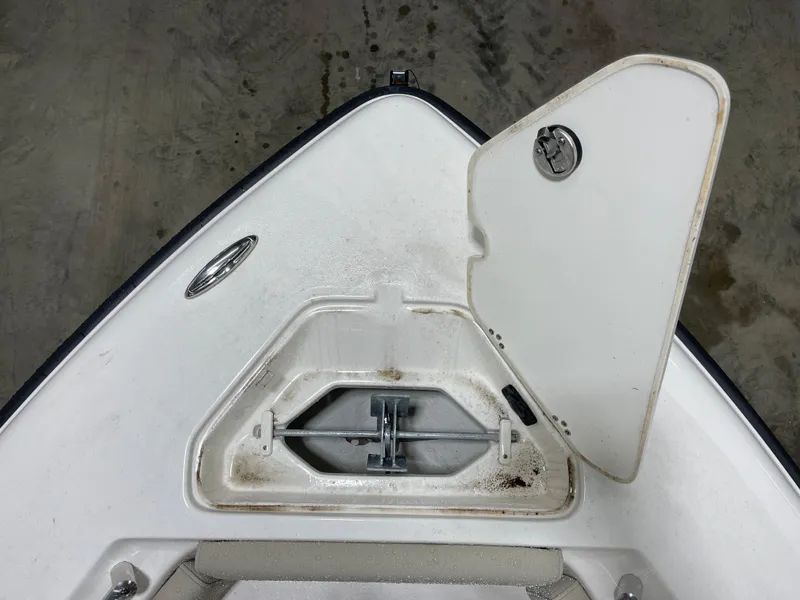 Slide: The Image of Bow storage compartment of 2025 Key West 219fs boat with open hatch. - 23