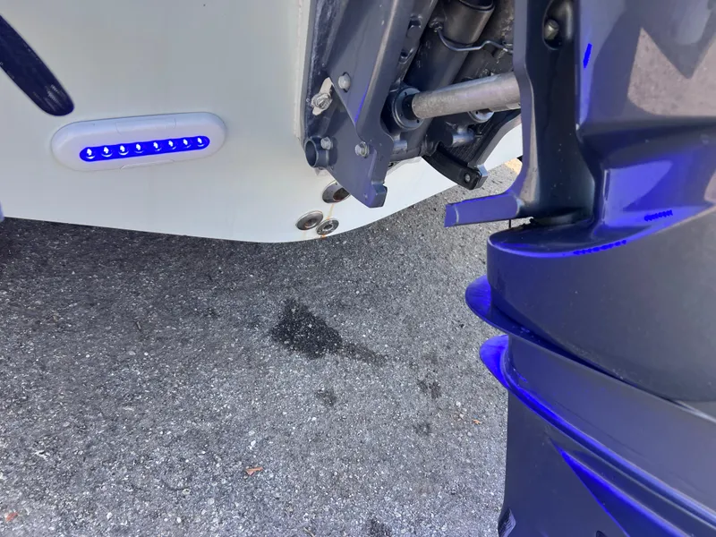 Slide: The Image of Outboard motor of 2003 Contender 21 Open with 2014 Yamaha 250, 82 hours, blue LED lights. - 11