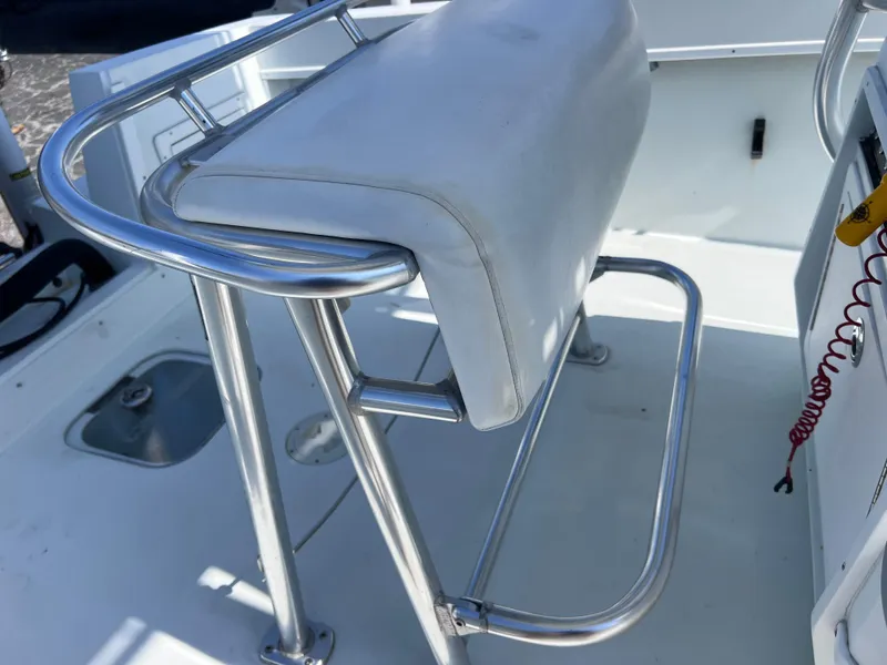 Slide: The Image of Stainless steel boat seat on 2003 Contender 21 Open with Yamaha 250 engine. - 27