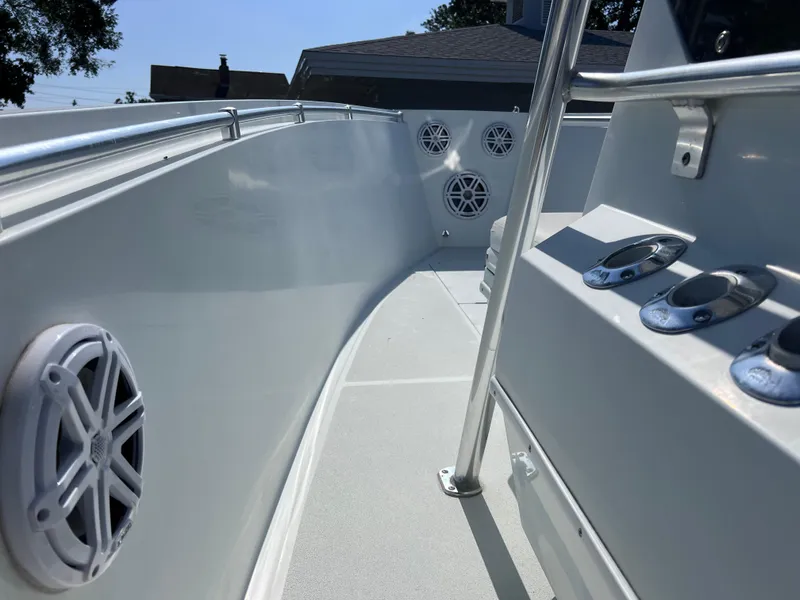 Slide: The Image of Contender 21 Open boat deck with speakers and railing, 2003 model, Yamaha 250 engine. - 30