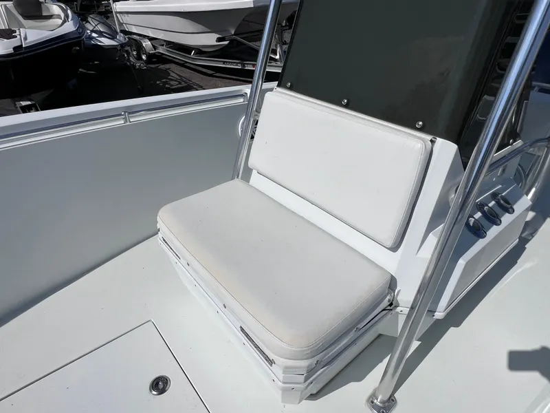 Slide: The Image of Contender 21 Open boat seat, 2003 model, with white cushion and stainless steel frame. - 37