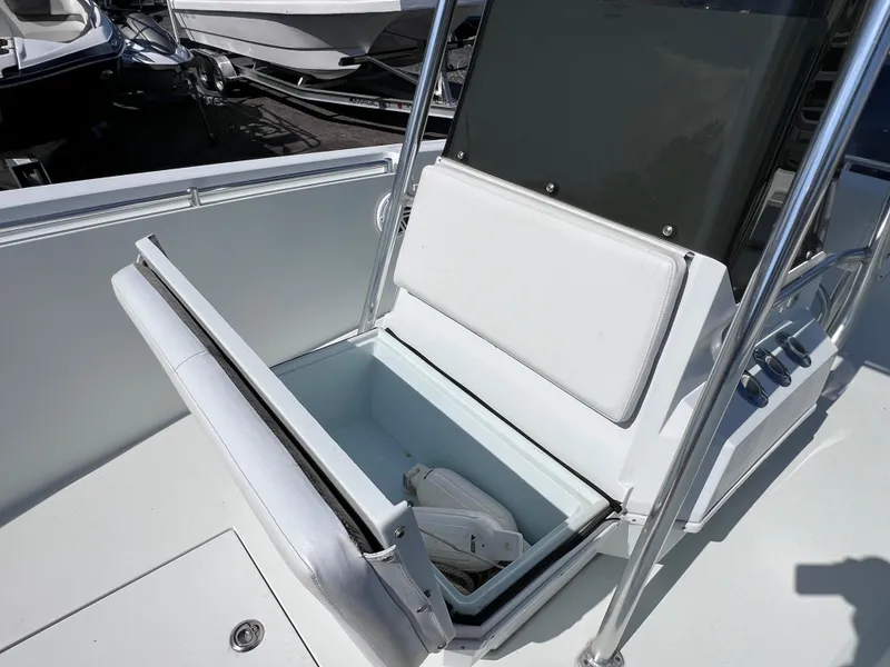 Slide: The Image of Open storage compartment on 2003 Contender 21 Open boat with Yamaha 250 engine. - 38