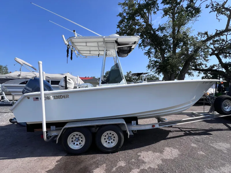 Slide: The Image of Contender 21 Open boat on trailer, 2014 Yamaha 250 engine, 82 hours, side view. - 4