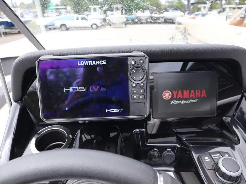 Slide: The Image of Dashboard of 2021 Yamaha Boats 212 with Lowrance HDS Live display. - 13