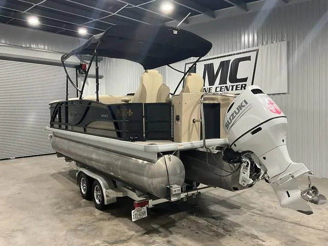 Slide: The Image of 2022 Godfrey Monaco 235 FS pontoon boat with Suzuki outboard motor in showroom. - 5