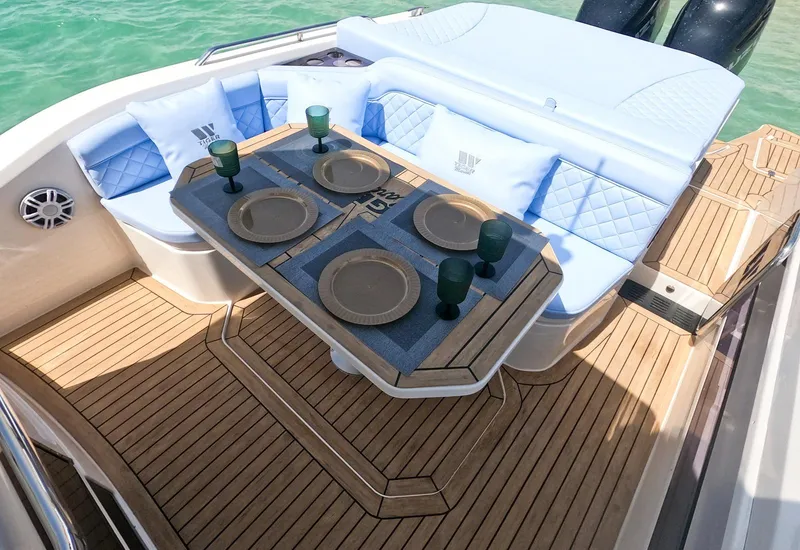Slide: The Image of Luxurious 2026 Tiger Marine Maxline 38 boat interior with elegant dining setup. - 7
