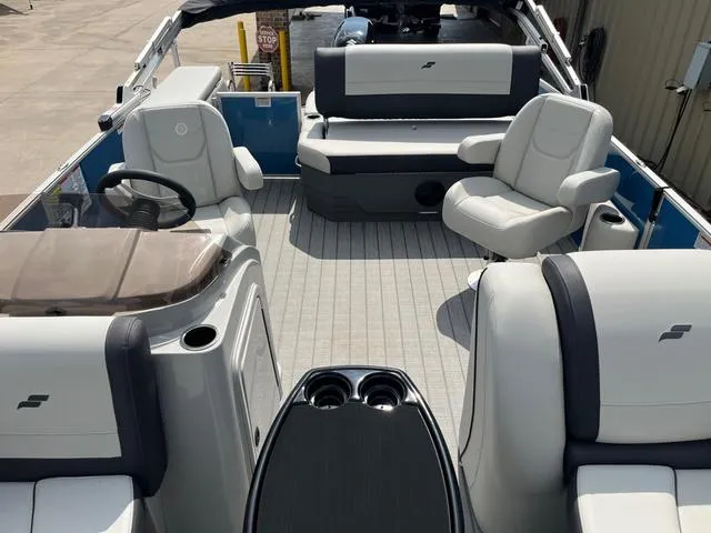 Slide: The Image of 2025 Starcraft EX20QDH boat interior with plush seating and modern design. - 19