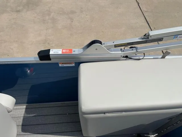 Slide: The Image of 2025 Starcraft EX20QDH boat interior with seating and railing detail. - 25