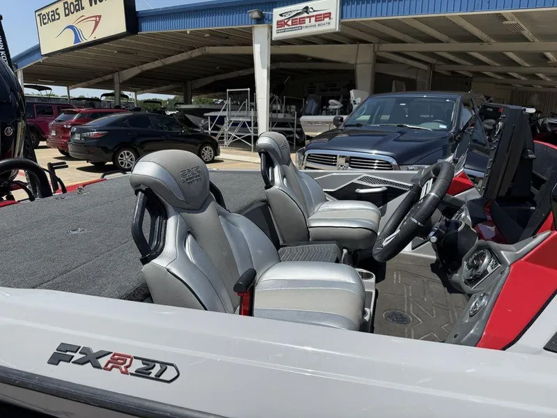 Slide: The Image of 2023 Skeeter FXR21 Limited boat interior at Texas Boat World dealership. - 14