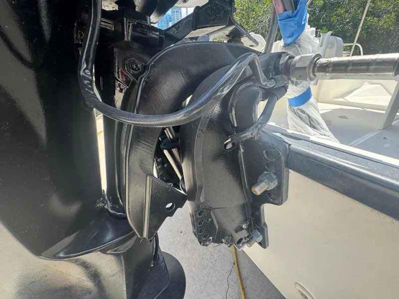 Slide: The Image of Close-up of a 2004 Boston Whaler 150 Sport boat engine component. - 8