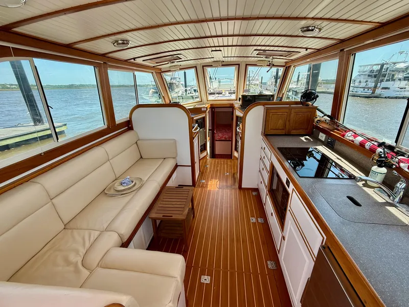 Slide: The Image of Luxurious interior of 2006 Mast & Mallet Thomas Point 40 yacht with elegant wood finishes. - 18