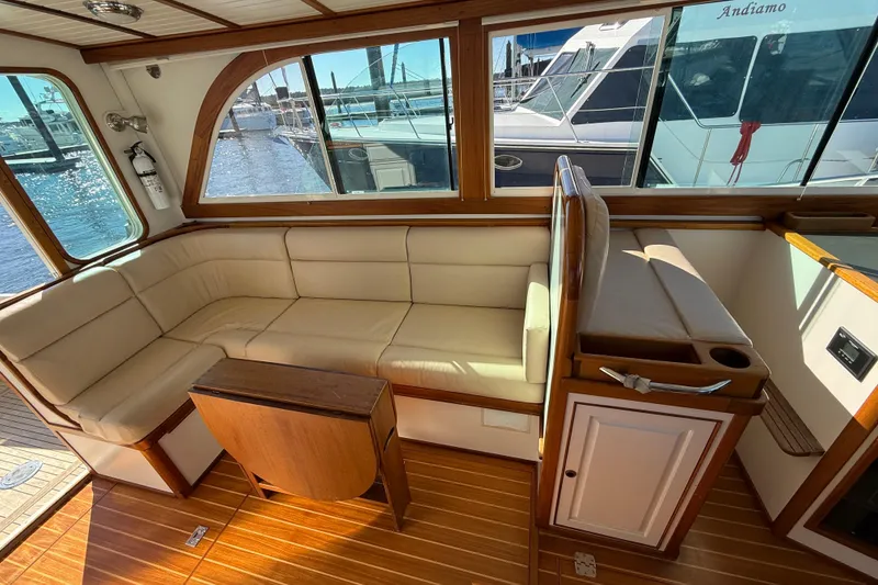 Slide: The Image of Interior of 2006 Mast & Mallet Thomas Point 40 yacht with beige seating and wooden accents. - 26