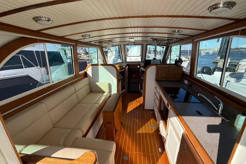 Slide: The Image of Interior of 2006 Mast & Mallet Thomas Point 40 yacht with elegant wood and leather finishes. - 28