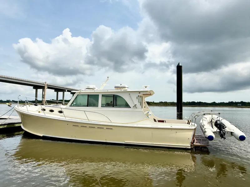 Slide: The Image of 2006 Mast & Mallet Thomas Point 40 boat docked on a cloudy day. - 3