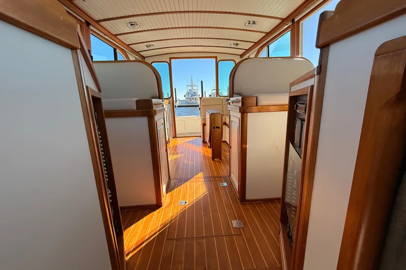 Slide: The Image of Interior of 2006 Mast & Mallet Thomas Point 40 boat with wooden finishes and spacious layout. - 30