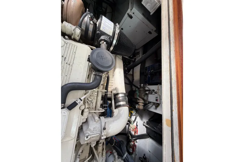 Slide: The Image of Engine compartment of 2006 Mast & Mallet Thomas Point 40 boat, showcasing mechanical components. - 42