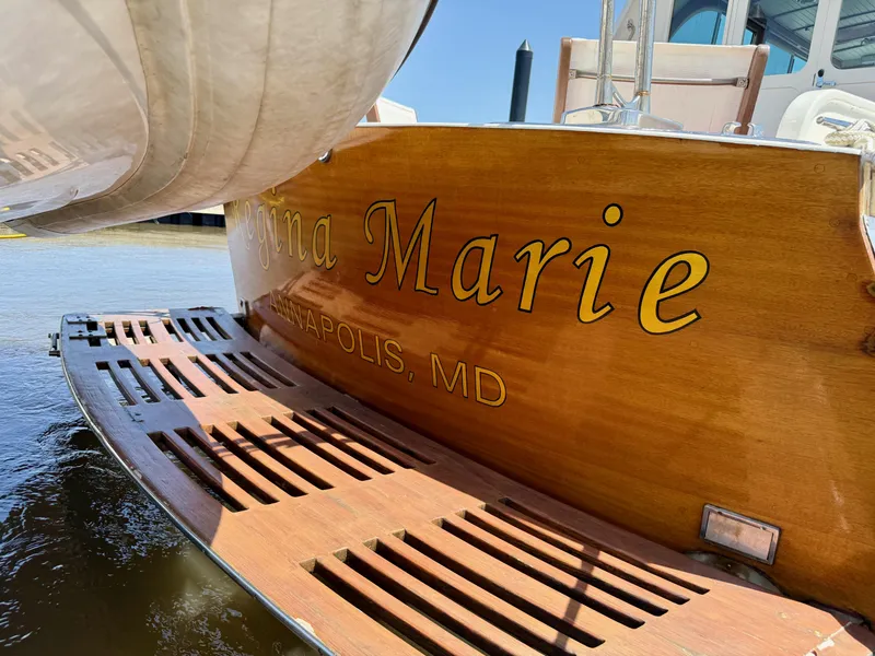 Slide: The Image of Mast & Mallet Thomas Point 40 boat, 2006, with wooden stern, docked in Annapolis, MD. - 5