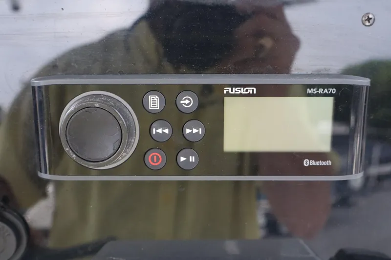 Slide: The Image of Fusion MS-RA70 Bluetooth stereo system on 2004 Edgewater 225CC boat dashboard. - 9