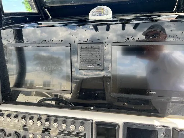 Slide: The Image of Dashboard of 2020 Tidewater 272 CC Adventure with dual Garmin displays and controls. - 3