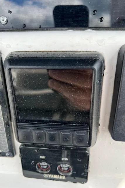 Slide: The Image of Close-up of a Yamaha control panel on a 2020 Tidewater 272 CC Adventure boat. - 8