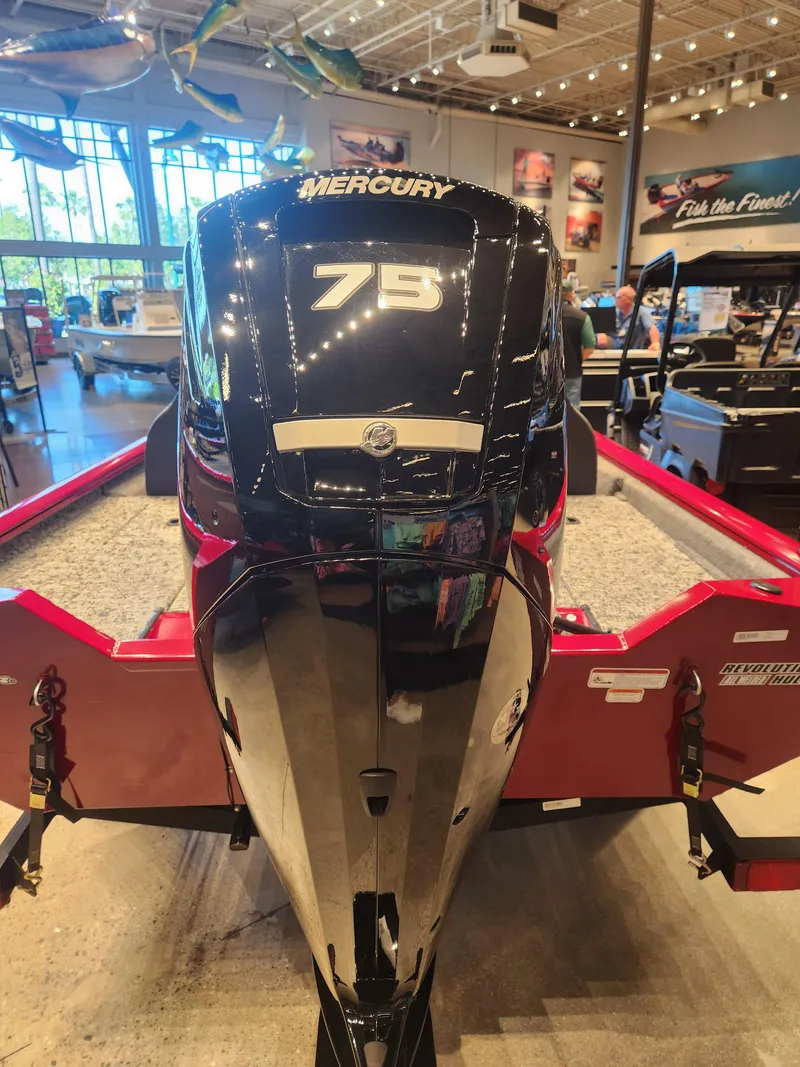 Slide: The Image of 2025 Tracker Pro Team 175 boat with Mercury 75 engine in showroom. - 3