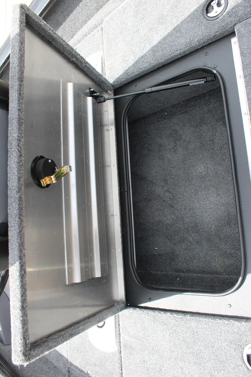 Slide: The Image of Open storage compartment in 2025 Tracker Pro Team 175 Crappie Edition boat. - 15
