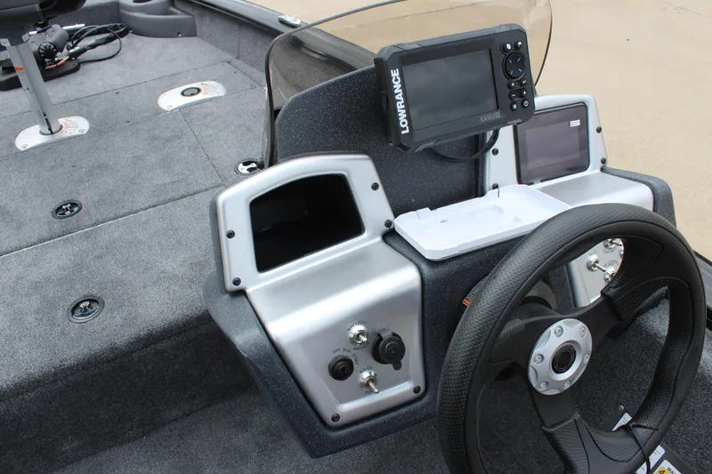 Slide: The Image of 2025 Tracker Pro Team 175 Crappie Edition boat dashboard with Lowrance fish finder. - 18