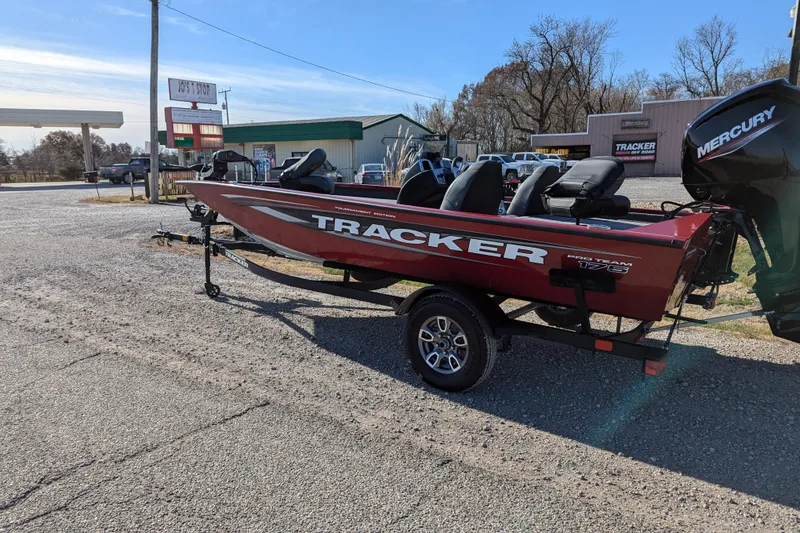 Slide: The Image of 2025 Tracker Pro Team 175 boat on trailer in parking lot. - 61