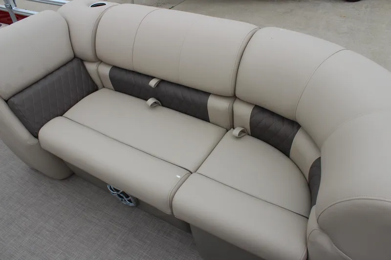 Slide: The Image of 2025 Sun Tracker Party Barge 22 DLX beige seating, comfortable and spacious design. - 10