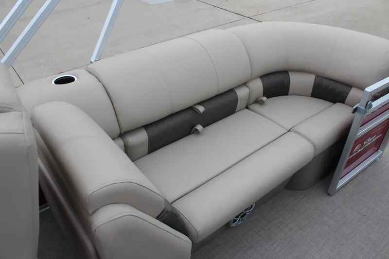 Slide: The Image of 2025 Sun Tracker Party Barge 22 DLX pontoon boat seating, beige upholstery, cup holder. - 17
