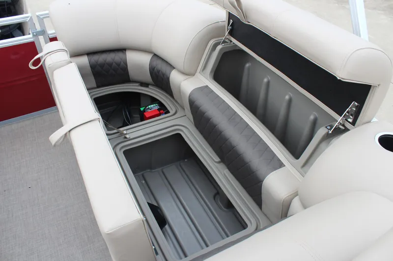 Slide: The Image of 2025 Sun Tracker Party Barge 22 DLX seating with open storage compartments. - 19