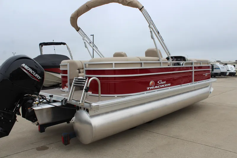 Slide: The Image of 2025 Sun Tracker Party Barge 22 DLX pontoon boat with Mercury outboard engine. - 3