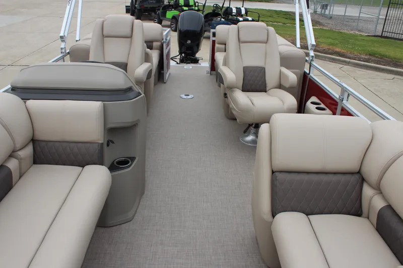 Slide: The Image of 2025 Sun Tracker Party Barge 22 DLX interior with plush seating and modern design. - 8