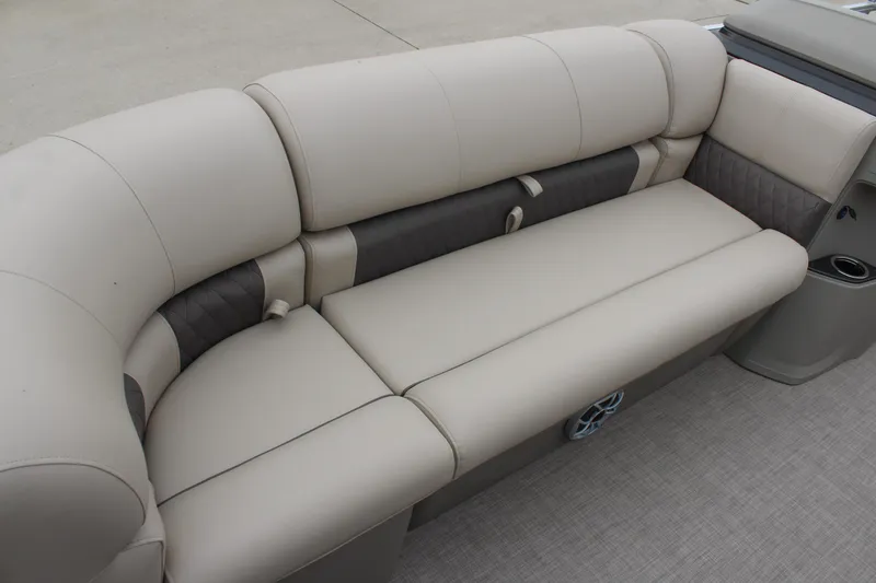 Slide: The Image of 2025 Sun Tracker Party Barge 22 DLX, beige seating, spacious and comfortable design. - 9