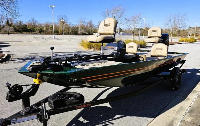Slide: The Image of 2025 Tracker Bass Tracker Classic Limited boat on trailer in parking lot. - 4