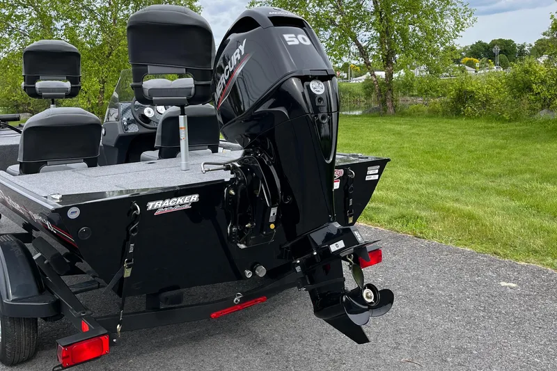 Slide: The Image of 2025 Tracker Bass Tracker Classic XL boat with Mercury 50 engine on a trailer. - 3