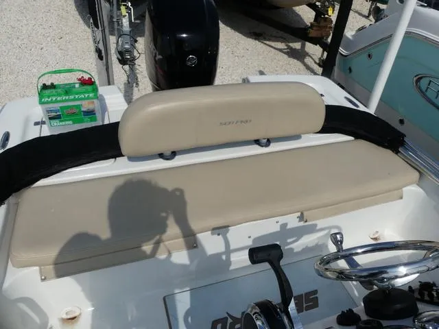 Slide: The Image of 2017 Sea Pro 172 boat interior with steering wheel and battery. - 8