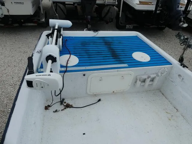 Slide: The Image of 2008 KenCraft Boats 1860 SKIFF with blue deck and trolling motor. - 11