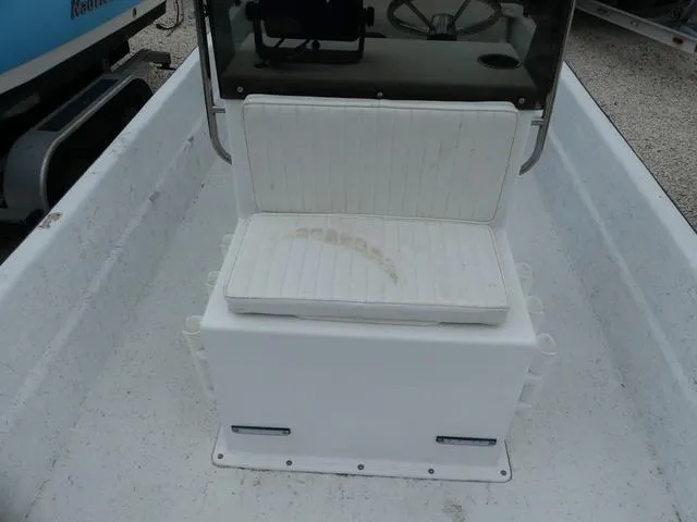 Slide: The Image of 2008 KenCraft 1860 SKIFF boat interior with white seating and console. - 12