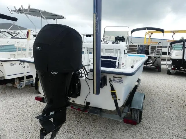 Slide: The Image of 2008 KenCraft Boats 1860 SKIFF on trailer, parked in a gravel lot. - 5