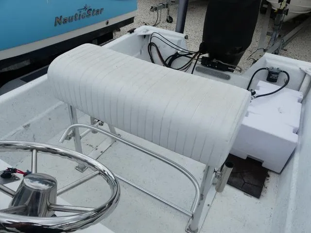 Slide: The Image of 2008 KenCraft Boats 1860 SKIFF interior with steering wheel and seating. - 9