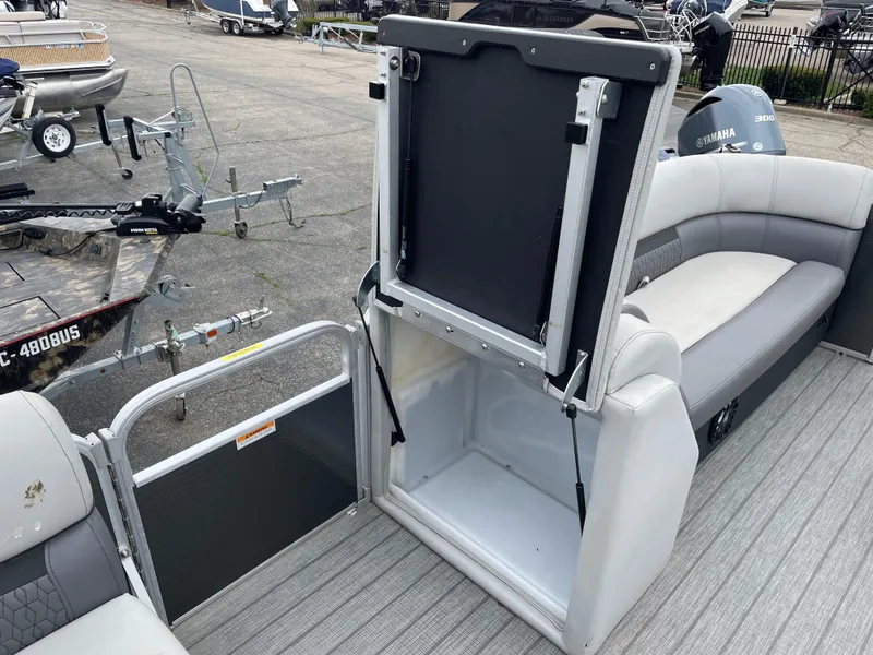 Slide: The Image of 2022 Godfrey Sweetwater 2286 FS pontoon boat interior with open storage compartment. - 17