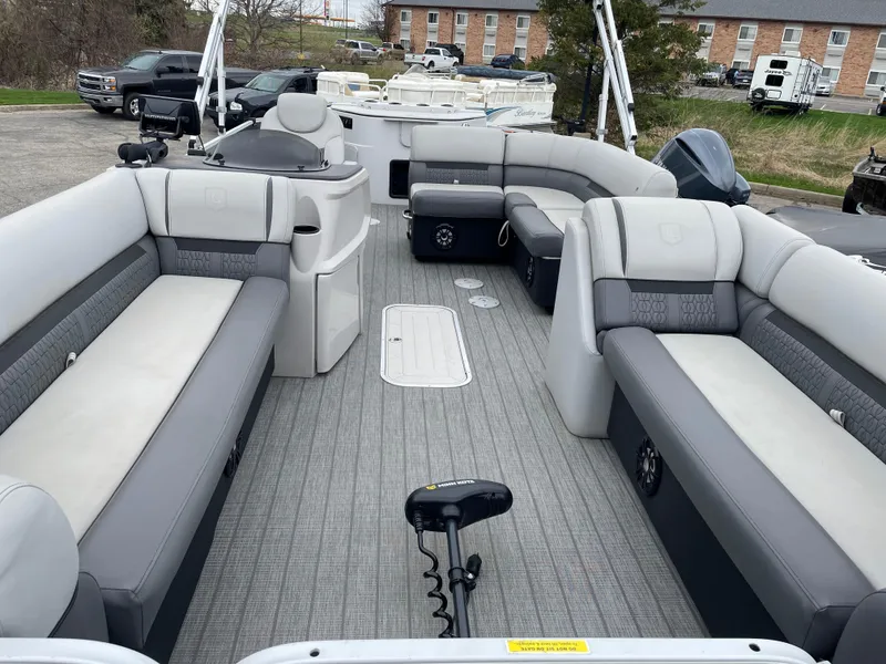 Slide: The Image of 2022 Godfrey Sweetwater 2286 FS pontoon boat with spacious seating and modern design. - 2