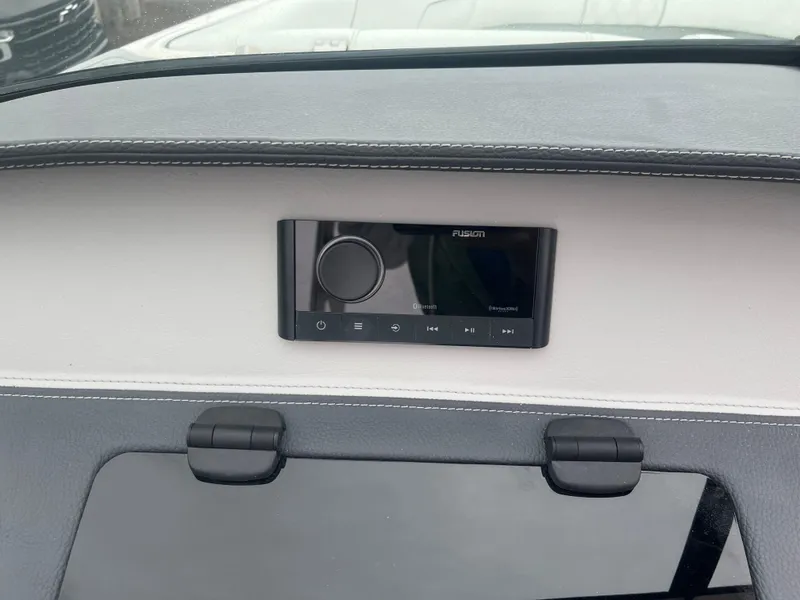 Slide: The Image of 2025 Regal LS4 Surf dashboard with Fusion audio system. - 15