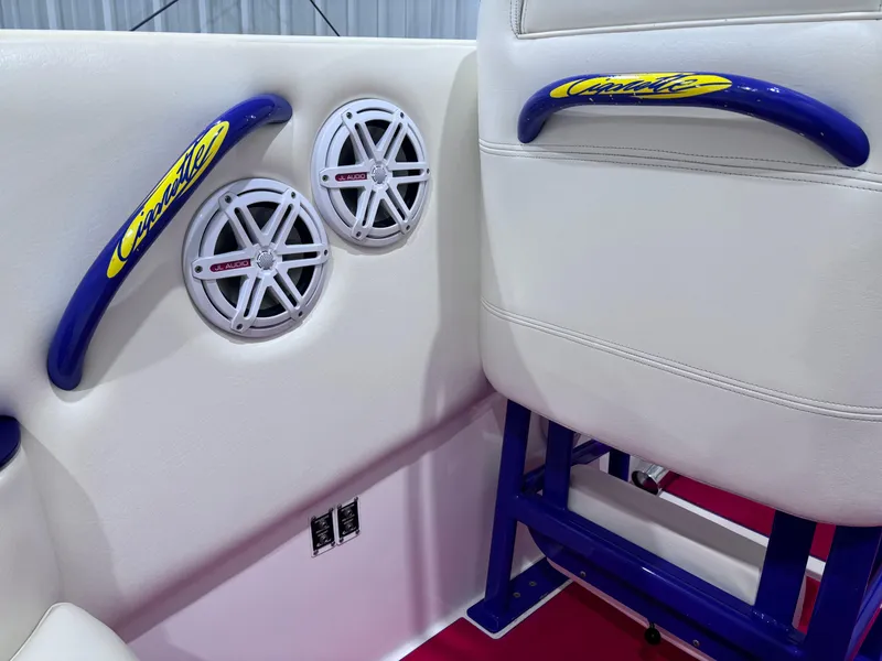 Slide: The Image of 2004 Cigarette 38 Top Gun boat interior with speakers and branded handles. - 19