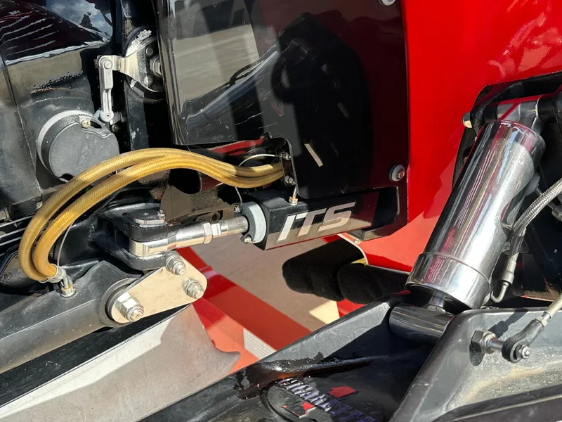 Slide: The Image of Close-up of 2004 Cigarette 38 Top Gun engine components and hydraulic system. - 30