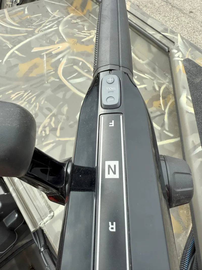 Slide: The Image of 2024 War Eagle 754LDV Sportsman boat control panel with camo design. - 14